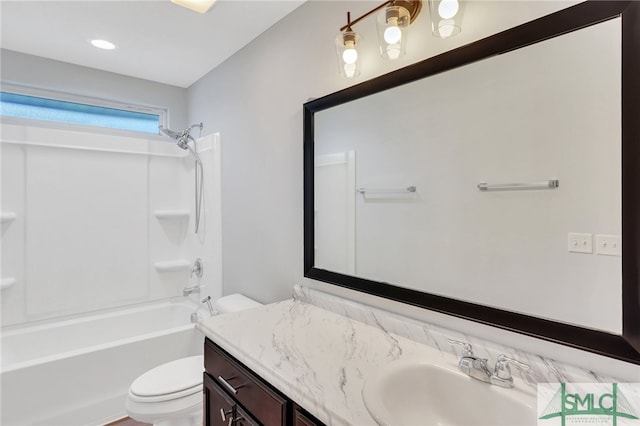 full bathroom with toilet, bathtub / shower combination, and vanity