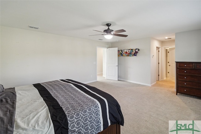 carpeted bedroom featuring ceiling fan