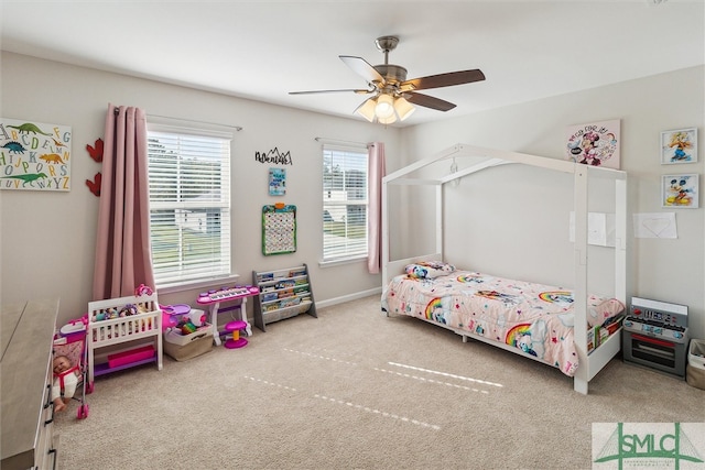 bedroom with ceiling fan and carpet