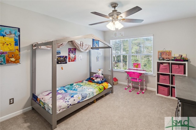 carpeted bedroom with ceiling fan