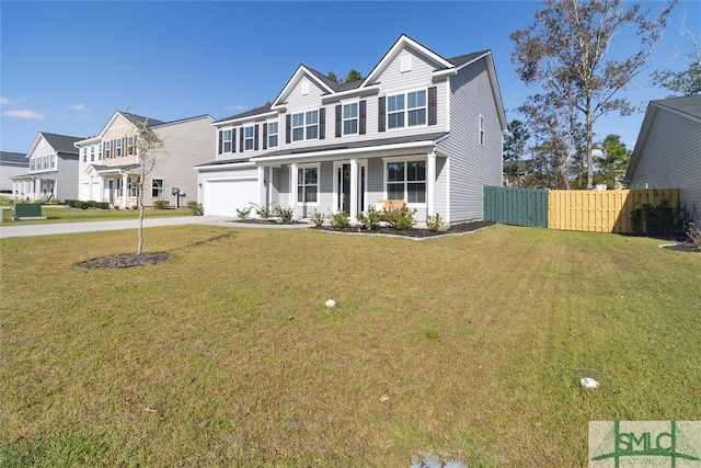 view of front of property with a front lawn, covered porch, and a garage