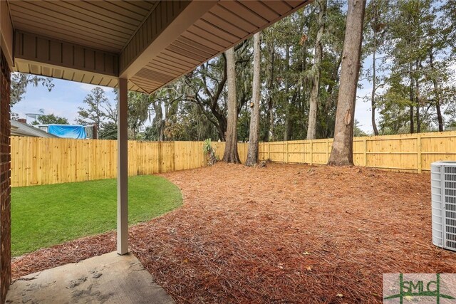 view of yard featuring central AC