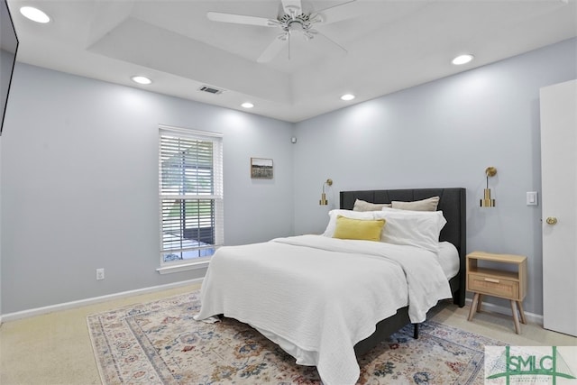 bedroom with light carpet and ceiling fan