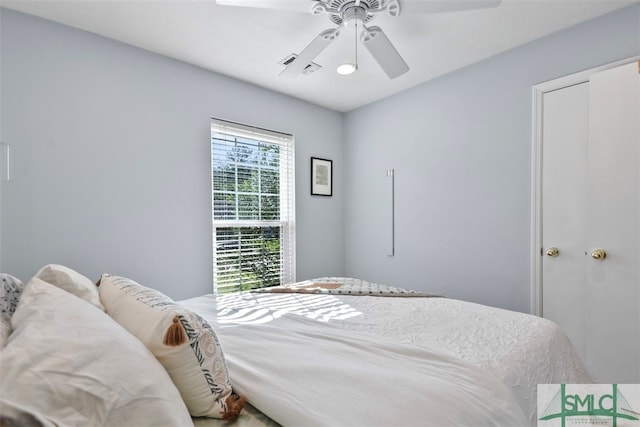 bedroom featuring ceiling fan