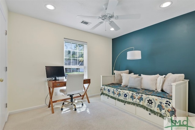 carpeted bedroom featuring ceiling fan