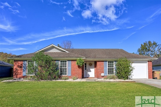 ranch-style home featuring a garage and a front lawn