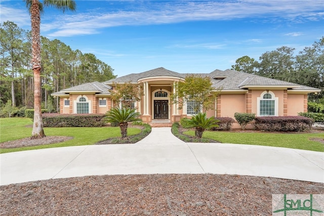 view of front of home with a front yard