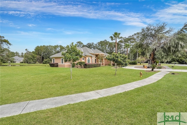 exterior space with a yard