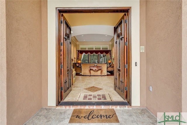 corridor with light tile patterned flooring