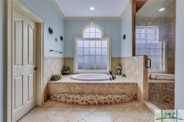 bathroom with tile patterned floors, crown molding, and separate shower and tub