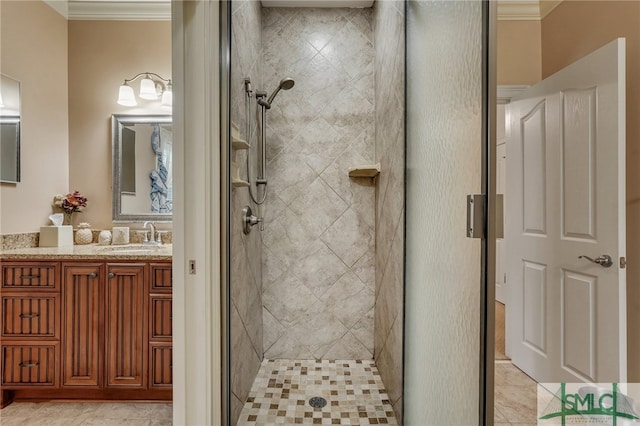 bathroom with vanity, walk in shower, and crown molding