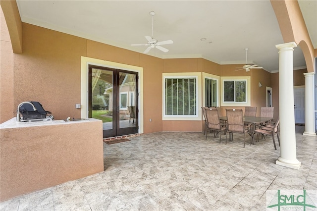 view of patio / terrace with ceiling fan and french doors