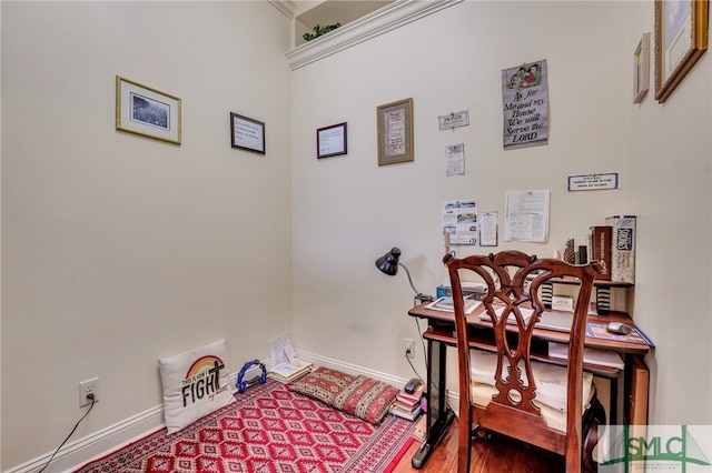 home office with hardwood / wood-style floors