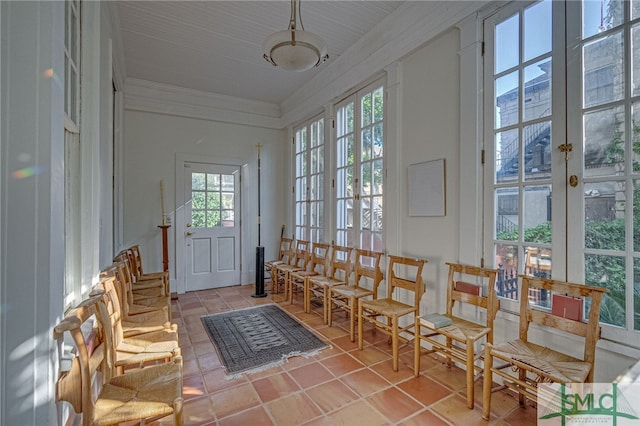 18 E 34th St, Savannah, GA 31401 - doorway with french doors, ornamental molding, and light tile patterned floors