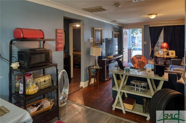 dining area featuring dark hardwood / wood-style flooring