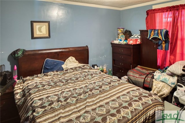 bedroom with crown molding and a textured ceiling