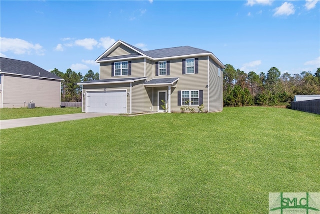 view of front property with a garage and a front yard