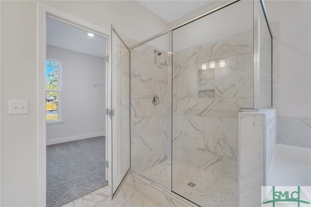 bathroom with a tile shower