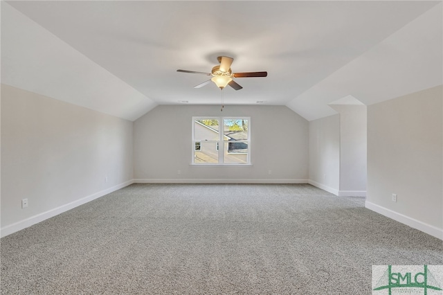 bonus room featuring ceiling fan, carpet, and vaulted ceiling