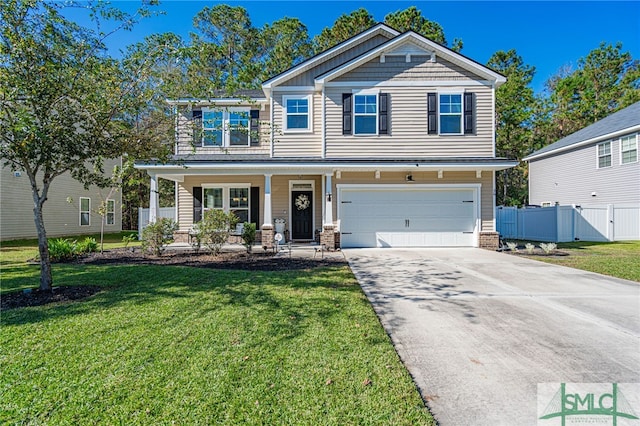 view of front facade with a garage and a front lawn