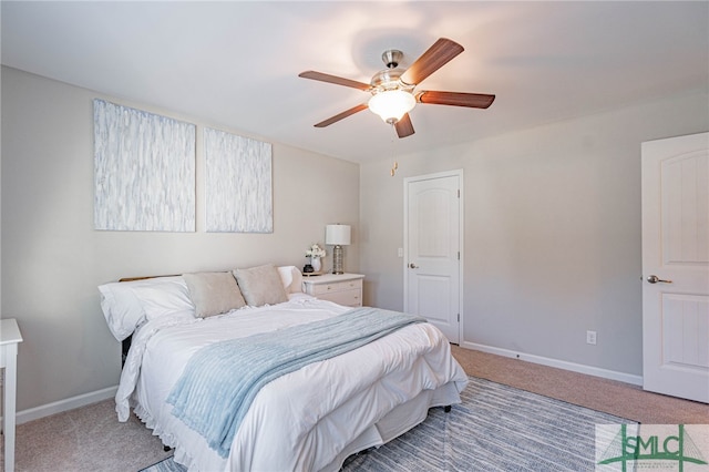 bedroom with ceiling fan and carpet floors