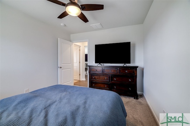 carpeted bedroom with ceiling fan