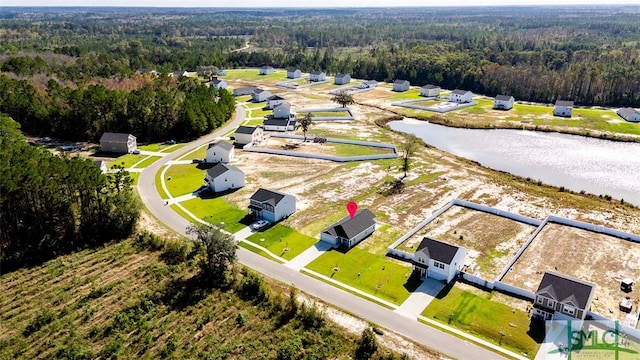 birds eye view of property featuring a water view