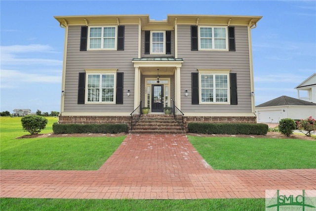 view of front facade with a front yard