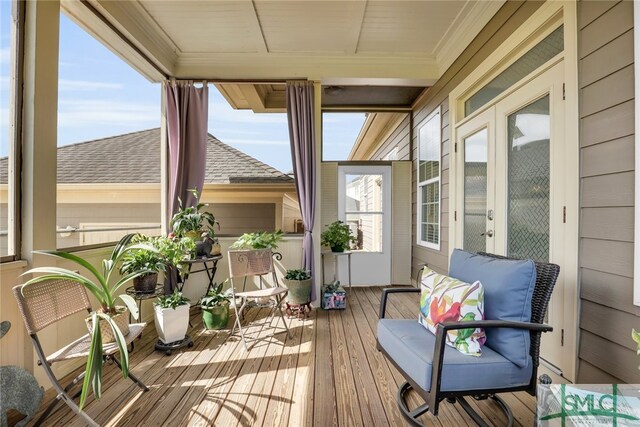 sunroom featuring plenty of natural light