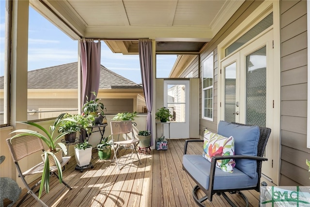 sunroom featuring french doors