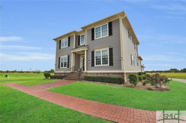 view of front of property featuring a front yard