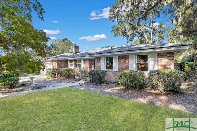 1462 Marlborough Way, Savannah, GA 31406 - single story home featuring a front yard, a chimney, brick siding, and a garage