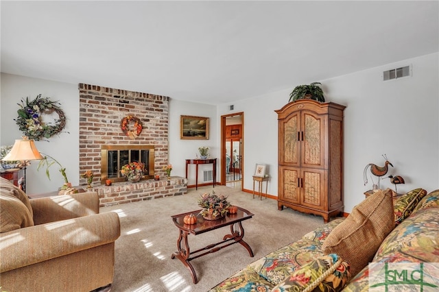 carpeted living room with a fireplace