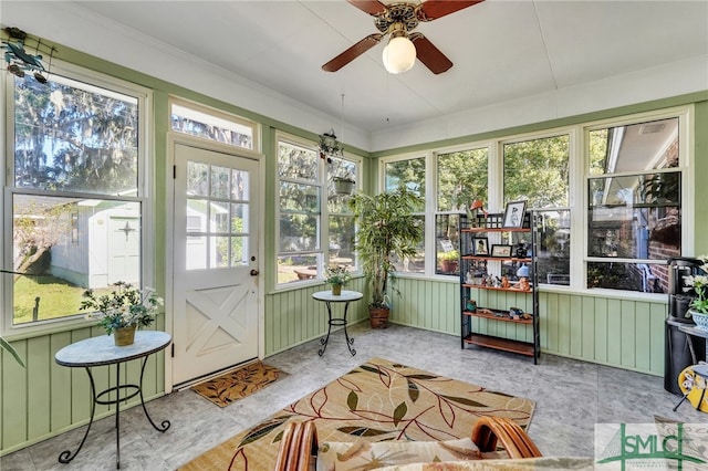 sunroom / solarium with ceiling fan