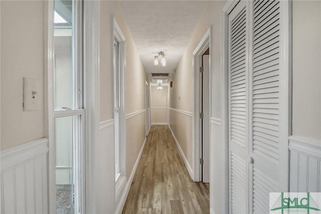 hall featuring light hardwood / wood-style flooring