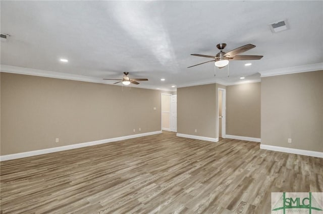 unfurnished room with crown molding, ceiling fan, and light hardwood / wood-style floors