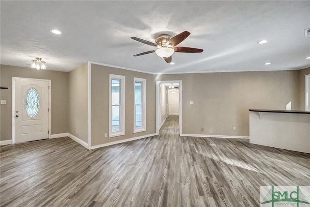 entrance foyer featuring ceiling fan and light wood-type flooring