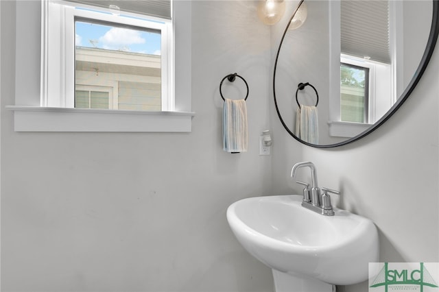 bathroom with sink and a wealth of natural light