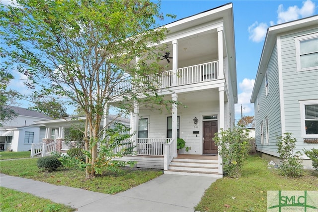 view of front of house featuring a porch and a balcony