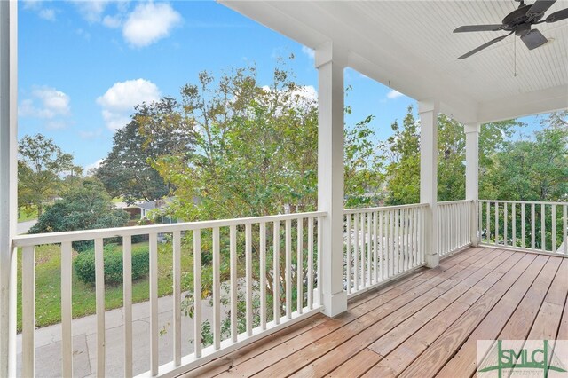 wooden deck with ceiling fan