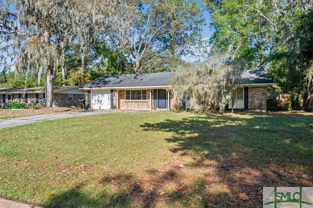 single story home featuring a front yard and a garage