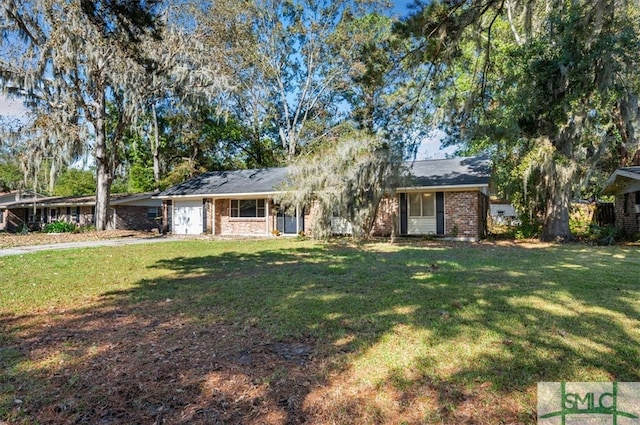 ranch-style home with a front lawn