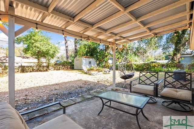 view of patio / terrace with a storage shed