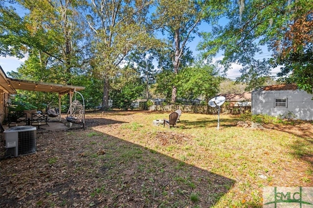 view of yard featuring central AC