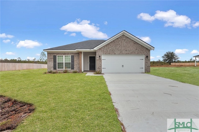 view of front facade with a garage and a front lawn