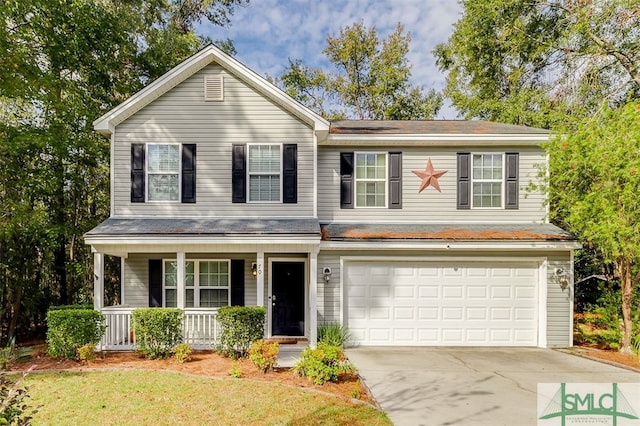 front facade with a porch and a garage