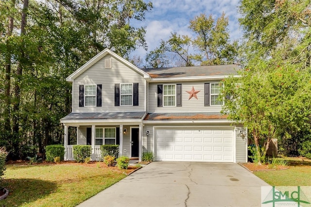 view of front property with a porch, a garage, and a front lawn