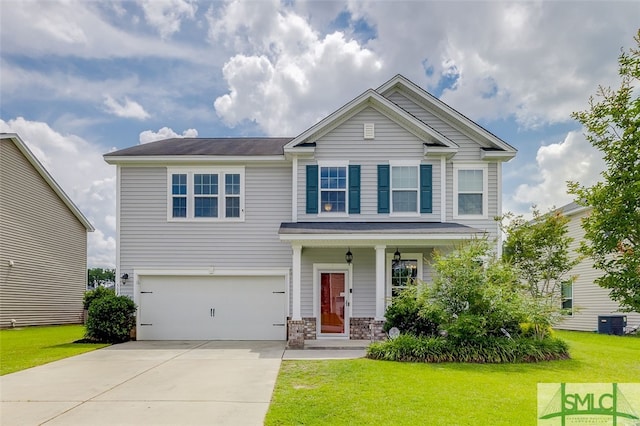 craftsman inspired home with cooling unit, a garage, and a front yard