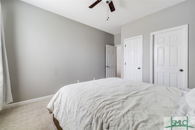 carpeted bedroom with ceiling fan