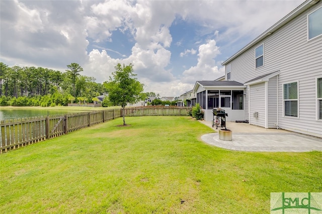 view of yard with a patio area and a sunroom